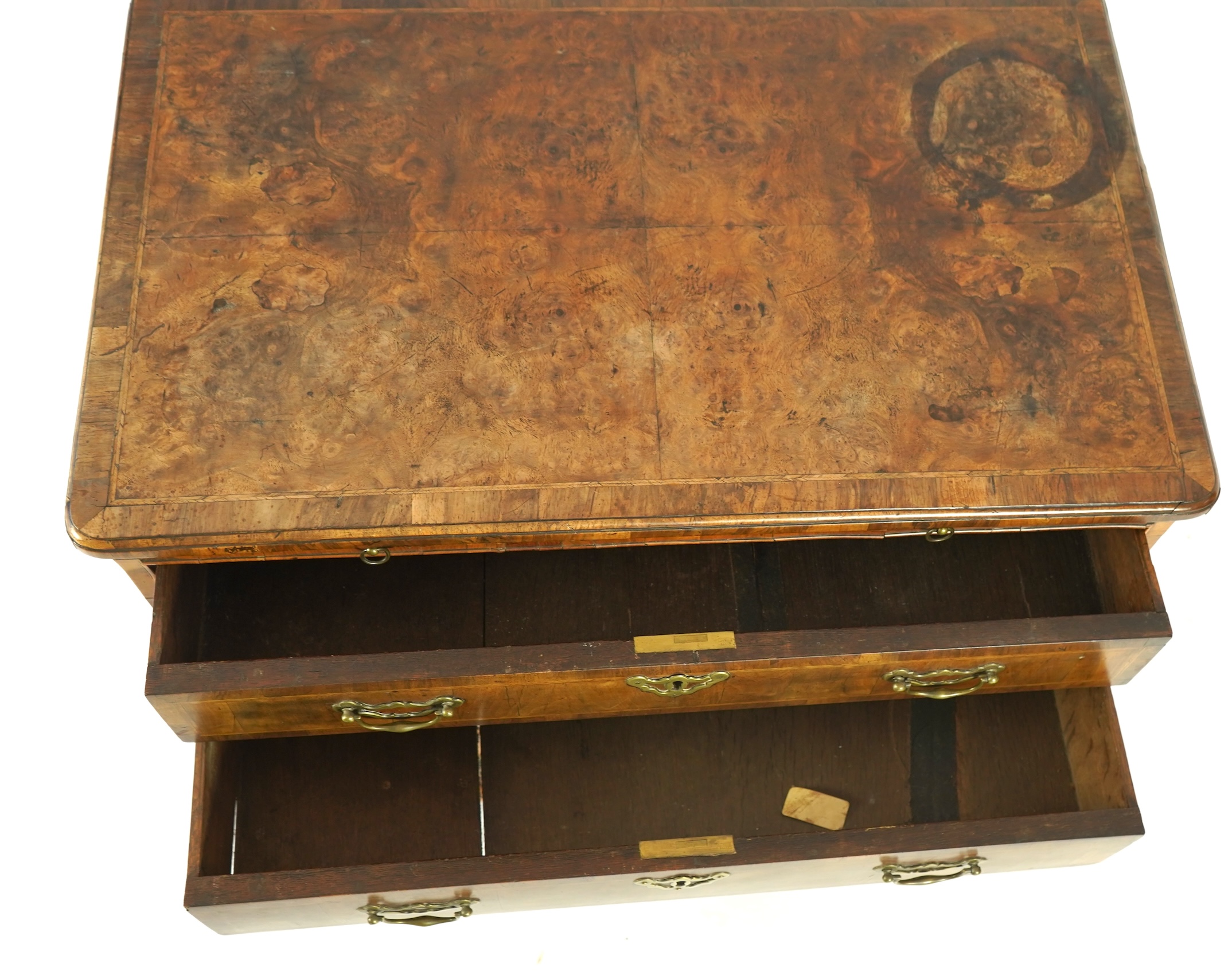 A small George I feather banded walnut chest